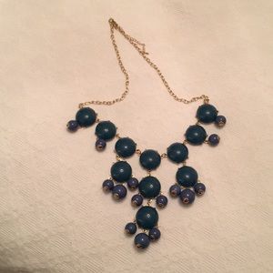 Teal with gold metal “Bubble” necklace.